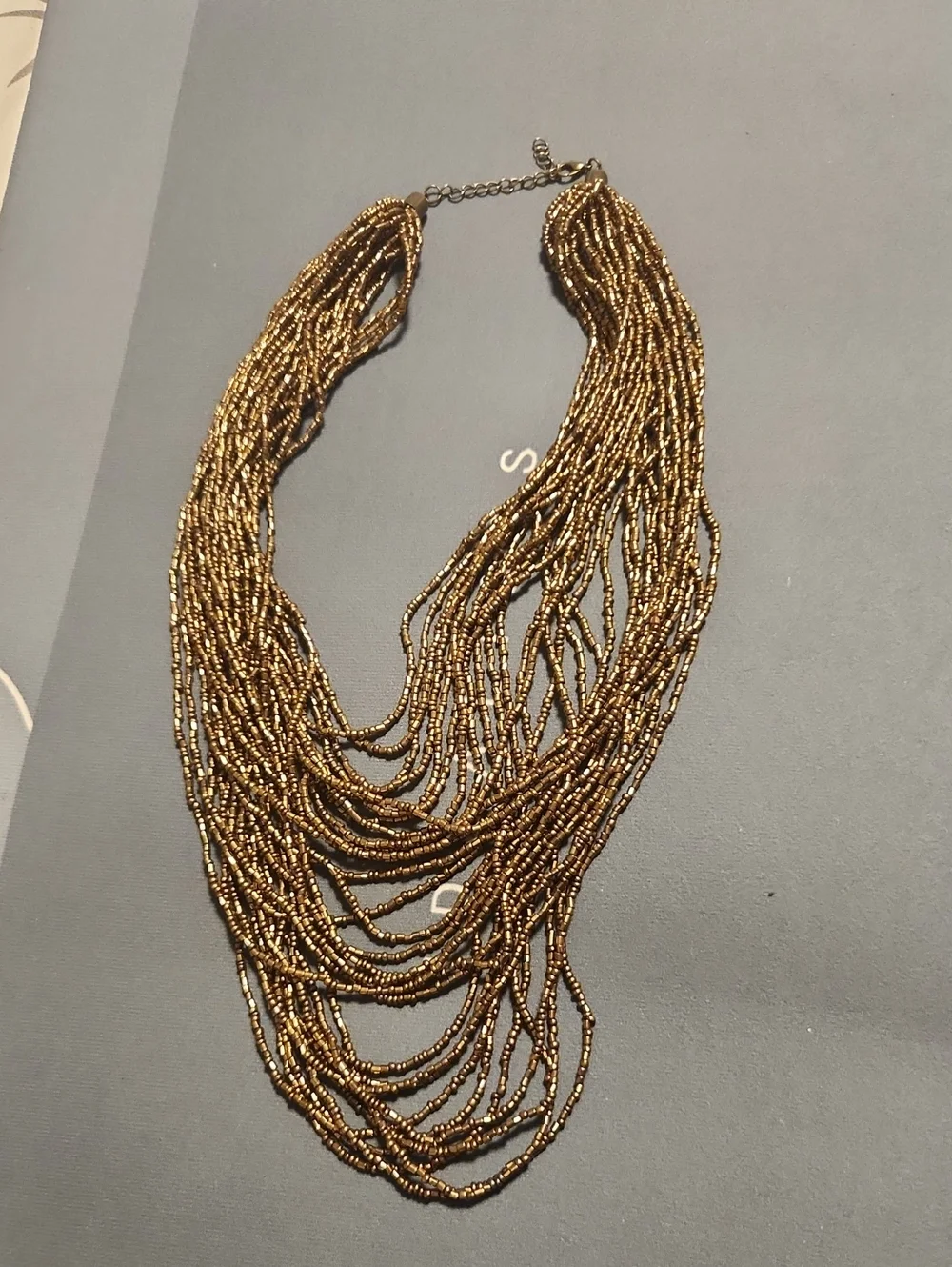 paparazzi Shimmering Gold Multi-Strand Beaded Necklace